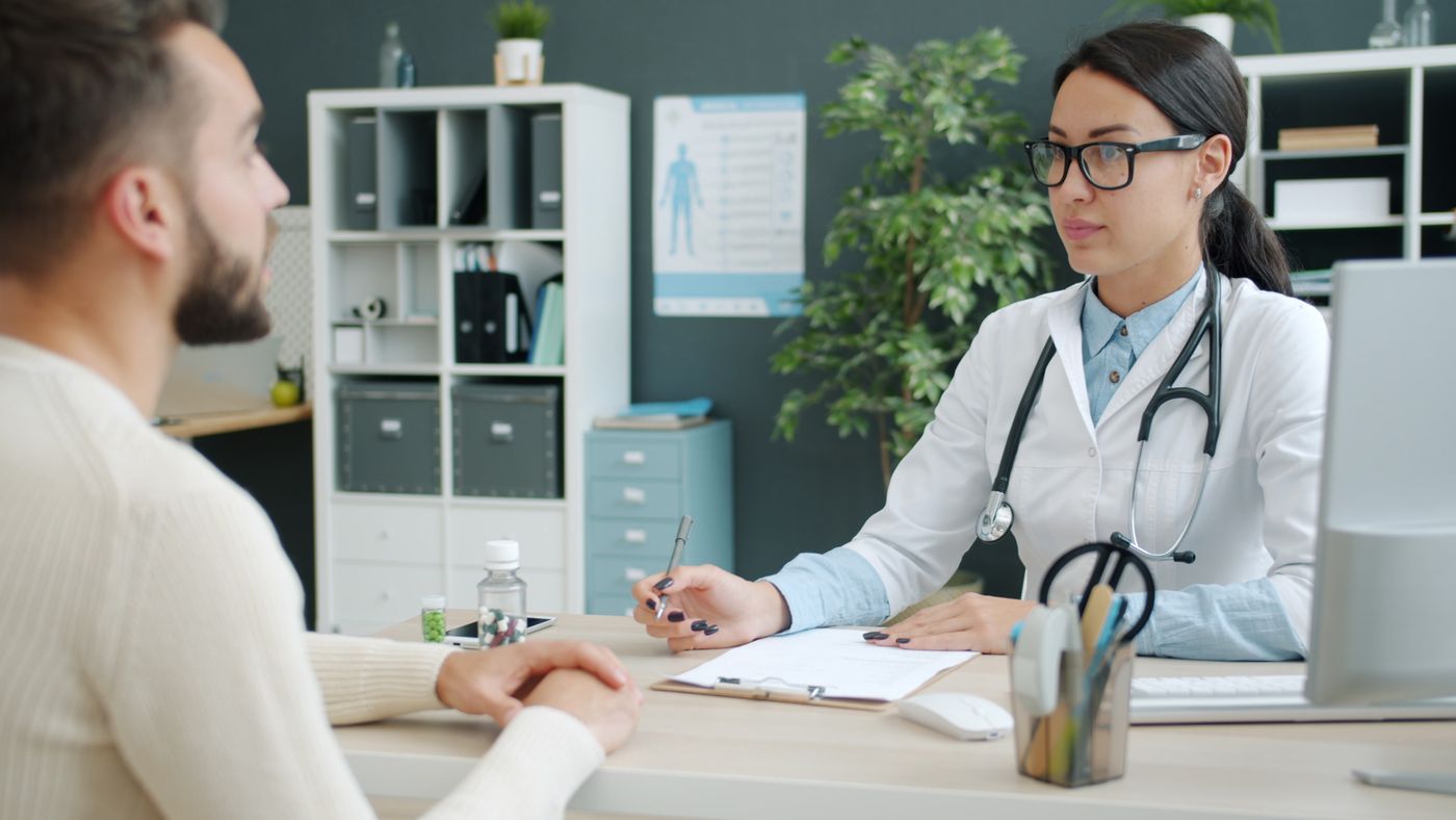 A sonographer and physician reviewing a study together